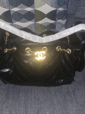 CHANEL Black Quilted Leather Shoulder Bag with Gold Hardware